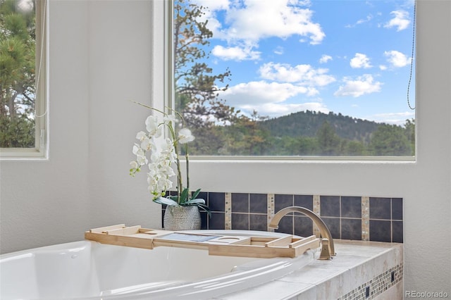 1474 Belford Ct, Evergreen, CO 80439 - detailed view of a tub to relax in and a mountain backdrop
