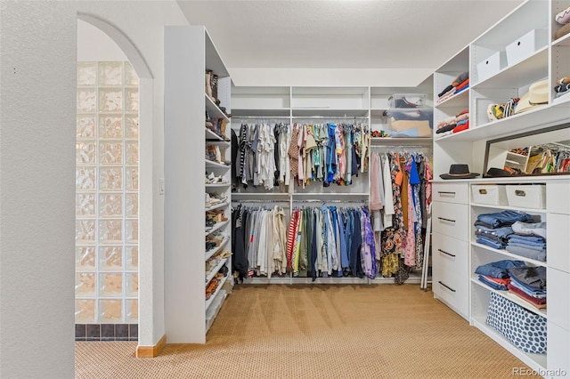 1474 Belford Ct, Evergreen, CO 80439 - spacious closet with carpet flooring and arched walkways