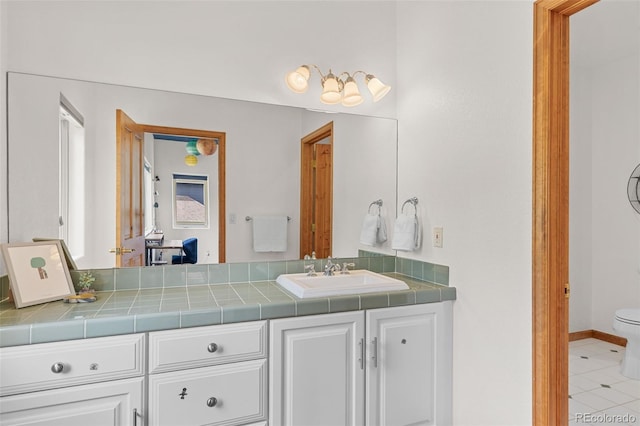 1474 Belford Ct, Evergreen, CO 80439 - bathroom with vanity and tile patterned floors