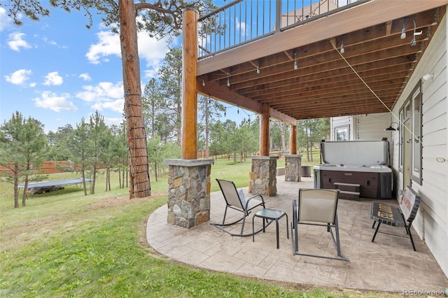 1474 Belford Ct, Evergreen, CO 80439 - view of patio / terrace with a hot tub