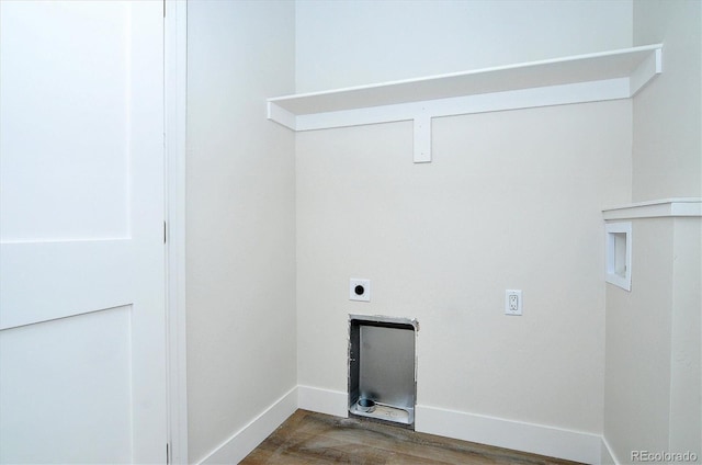 washroom with hardwood / wood-style flooring, hookup for a washing machine, and hookup for an electric dryer