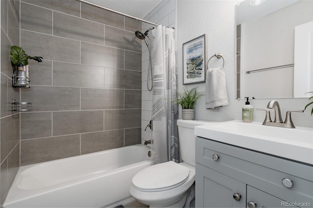 8559 W 75th Pl, Arvada, CO 80005 - bathroom featuring toilet, shower / bath combination with curtain, and vanity