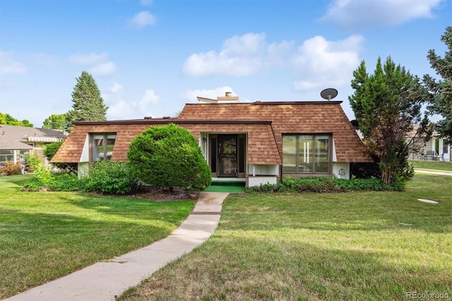 46 Douglas Dr, Broomfield, CO 80020 - view of front of property featuring a front yard, roof with shingles, and mansard roof