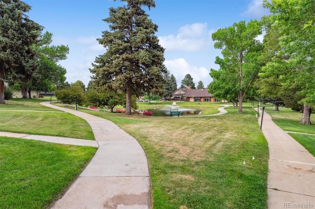 46 Douglas Dr, Broomfield, CO 80020 - surrounding community with a yard
