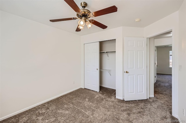 unfurnished bedroom featuring a closet, ceiling fan, and dark colored carpet