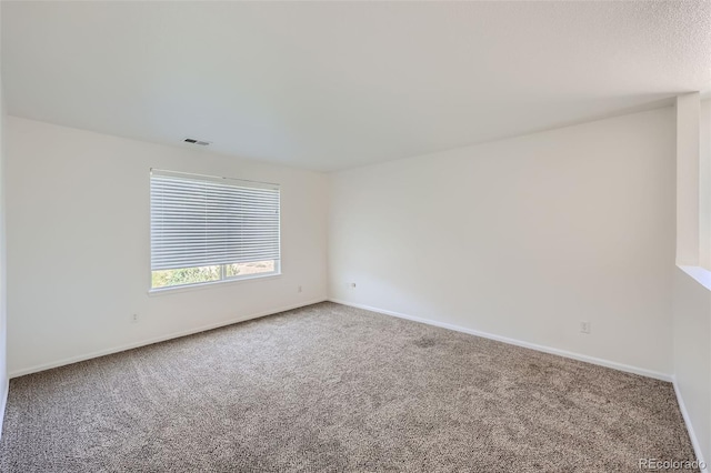 empty room with carpet floors