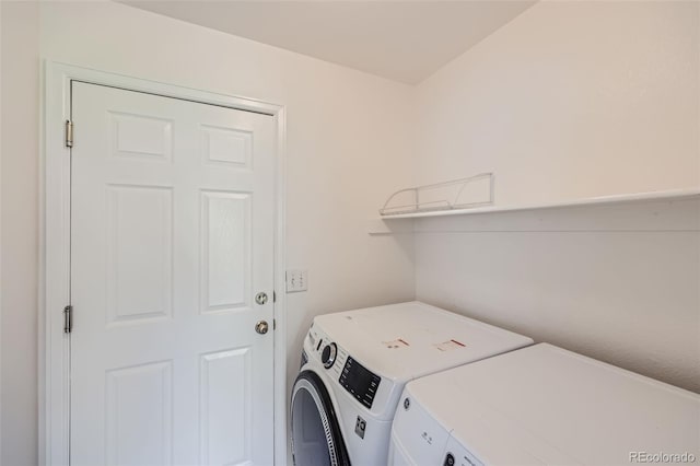 laundry area with washer and clothes dryer