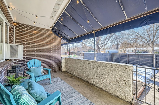 balcony featuring cooling unit and an outdoor hangout area