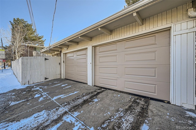 view of snow covered garage