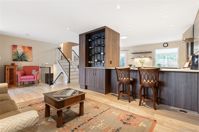 1615 Violet St, Golden, CO 80401 - bar area featuring light wood-style floors, stairway, and recessed lighting
