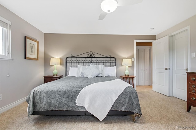 1615 Violet St, Golden, CO 80401 - bedroom with light carpet and a ceiling fan