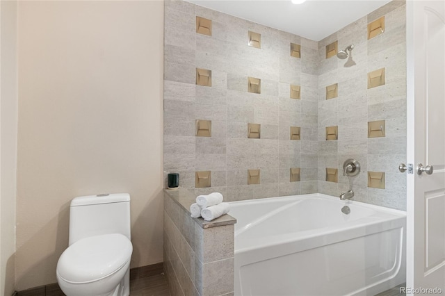 1615 Violet St, Golden, CO 80401 - bathroom featuring a tub to relax in and toilet