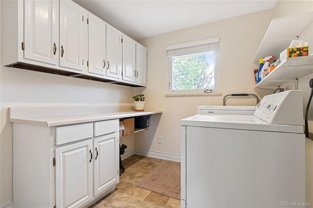 1615 Violet St, Golden, CO 80401 - washroom with washing machine and clothes dryer and cabinet space