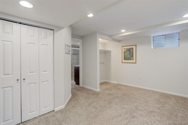 10966 W Half Moon Pass, Littleton, CO 80127 - unfurnished bedroom with carpet floors, recessed lighting, baseboards, and a closet