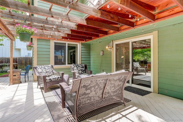 10966 W Half Moon Pass, Littleton, CO 80127 - deck with a pergola and outdoor lounge area