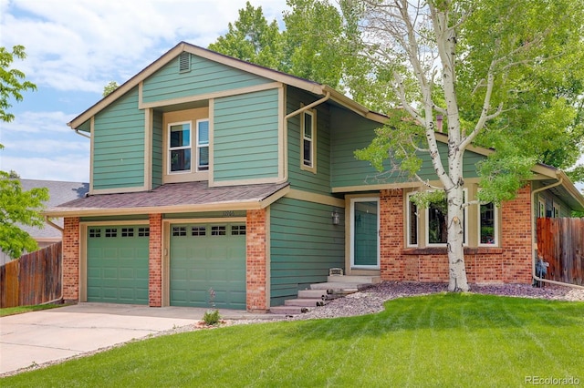 10966 W Half Moon Pass, Littleton, CO 80127 - view of front of home with brick siding, concrete driveway, and an attached garage