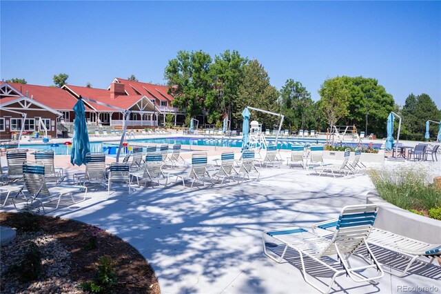 10966 W Half Moon Pass, Littleton, CO 80127 - community pool with a patio
