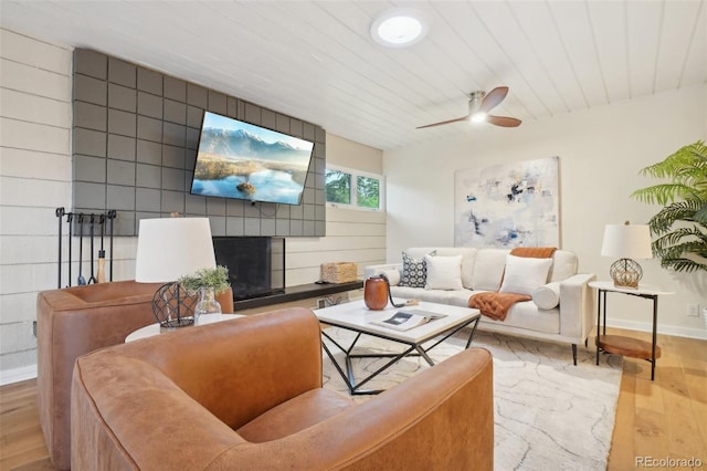 5405 S Lowell Blvd, Littleton, CO 80123 - living area with wood finished floors, baseboards, and a ceiling fan
