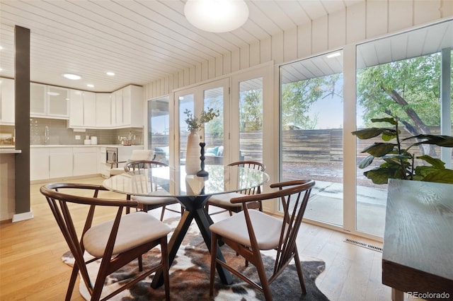 5405 S Lowell Blvd, Littleton, CO 80123 - dining area featuring light wood-type flooring, recessed lighting, and wooden ceiling