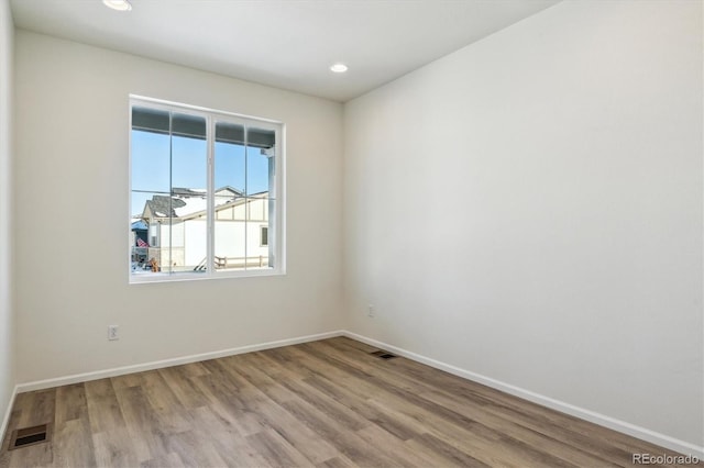 empty room featuring light hardwood / wood-style flooring