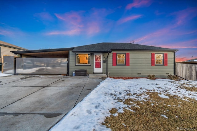 single story home with a carport