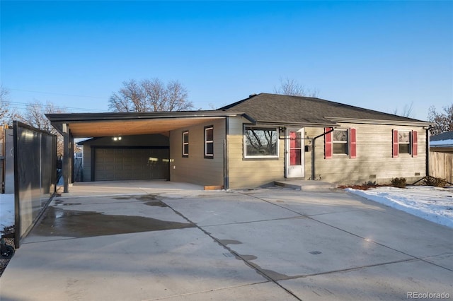 single story home with a garage and a carport