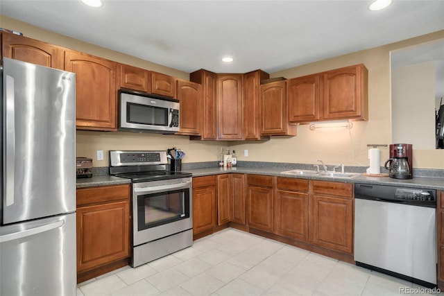 kitchen featuring appliances with stainless steel finishes and sink