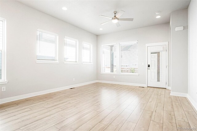 20968 E 60th Pl, Aurora, CO 80019 - empty room featuring ceiling fan, light wood finished floors, a smoke detector, and recessed lighting
