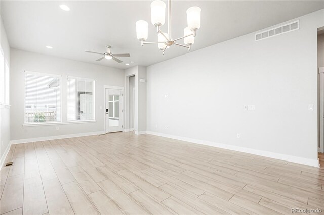 20968 E 60th Pl, Aurora, CO 80019 - unfurnished room featuring a chandelier, a ceiling fan, light wood-style floors, and recessed lighting