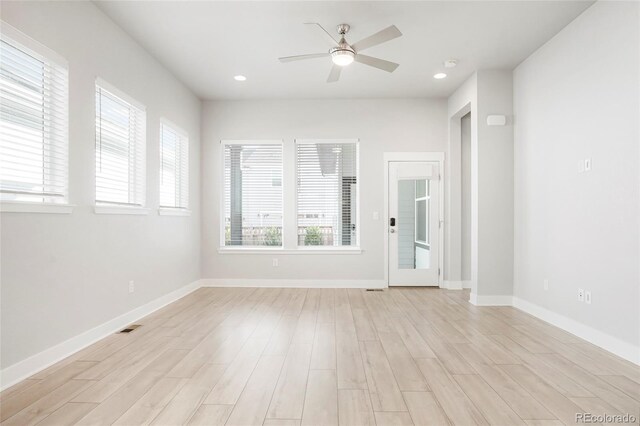 20968 E 60th Pl, Aurora, CO 80019 - empty room featuring light wood-type flooring, a ceiling fan, and recessed lighting