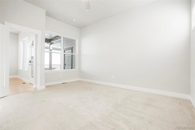 20968 E 60th Pl, Aurora, CO 80019 - carpeted empty room featuring baseboards and a ceiling fan