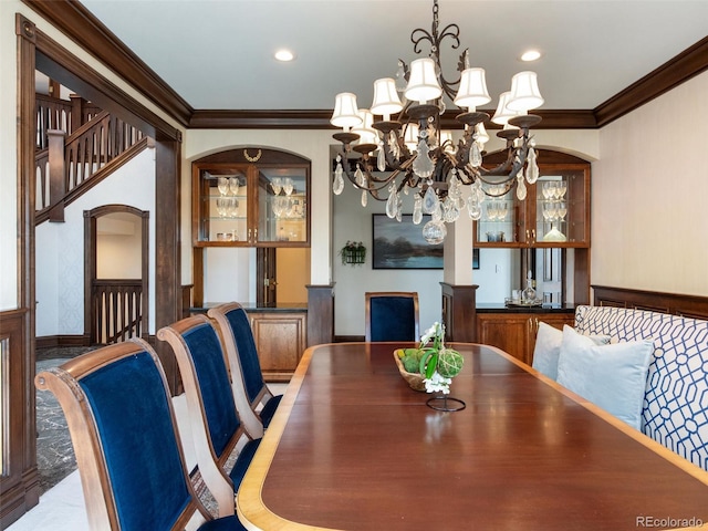 1189 Rembrandt Rd, Boulder, CO 80302 - dining space with crown molding, a chandelier, and recessed lighting