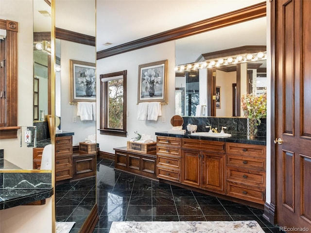 1189 Rembrandt Rd, Boulder, CO 80302 - bathroom featuring crown molding and vanity