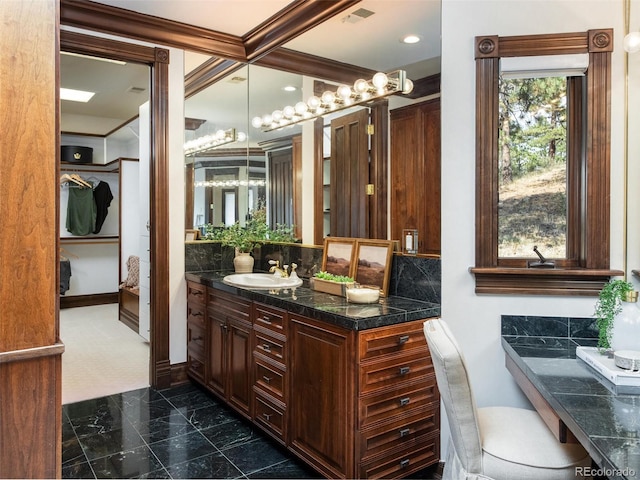 1189 Rembrandt Rd, Boulder, CO 80302 - bathroom featuring vanity, decorative backsplash, and marble finish floors