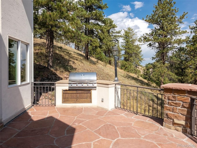 1189 Rembrandt Rd, Boulder, CO 80302 - view of patio with an outdoor kitchen