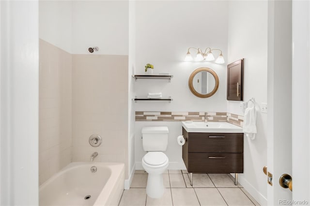 bathroom with washtub / shower combination, tile patterned flooring, vanity, and toilet