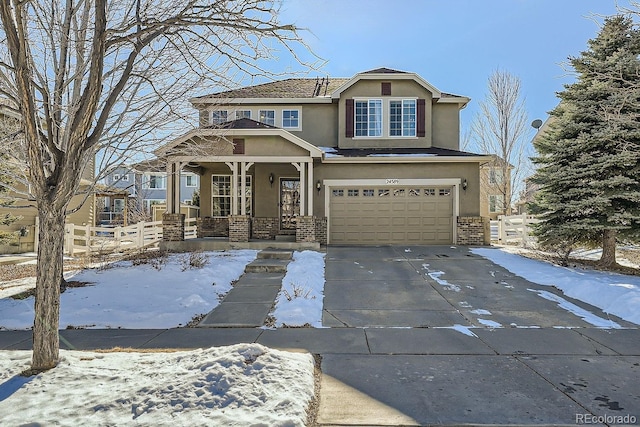 view of front of property with a garage