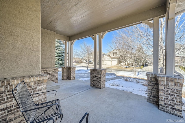 view of snow covered patio