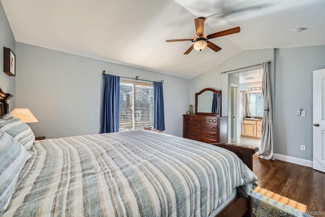 bedroom with ceiling fan, lofted ceiling, dark hardwood / wood-style flooring, and ensuite bath