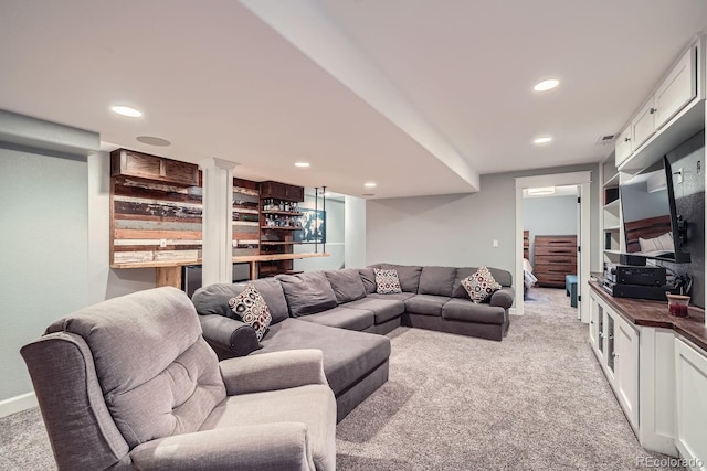 living room featuring light carpet