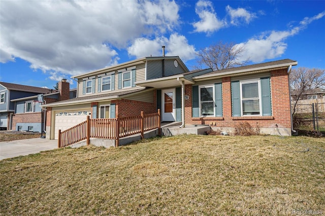 view of front of home featuring a front lawn, fence, concrete driveway, a garage, and brick siding