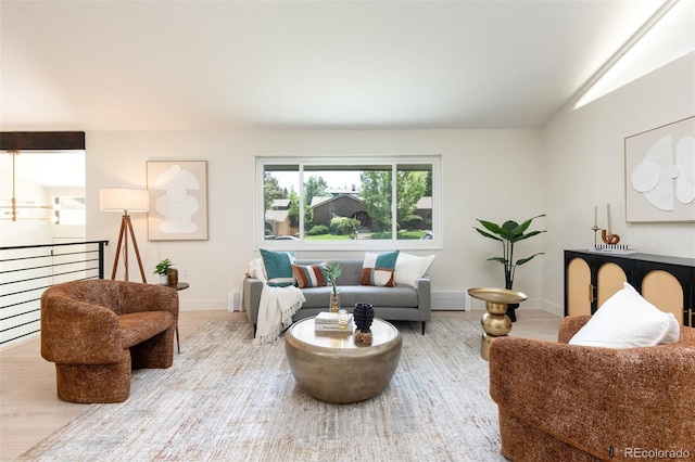 7453 E Jefferson Dr, Denver, CO 80237 - living area with wood finished floors and vaulted ceiling