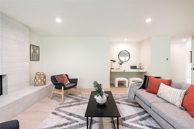 7453 E Jefferson Dr, Denver, CO 80237 - living area with recessed lighting, wood finished floors, and a fireplace