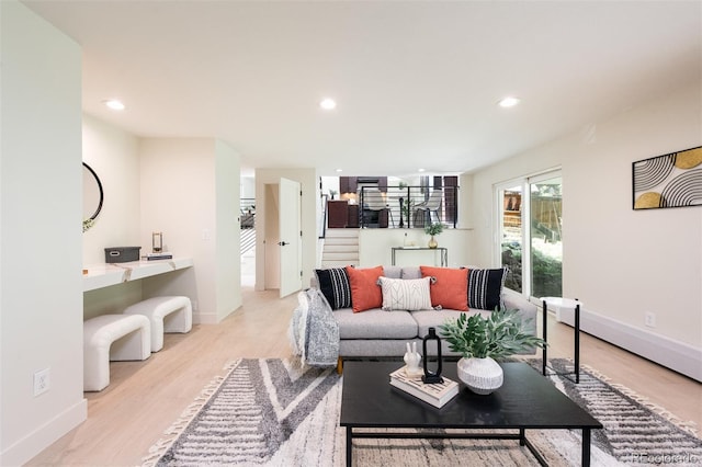 7453 E Jefferson Dr, Denver, CO 80237 - living area featuring light wood-style floors, recessed lighting, and stairway