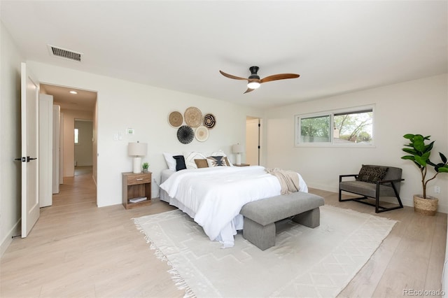 7453 E Jefferson Dr, Denver, CO 80237 - bedroom with light wood-style flooring and a ceiling fan