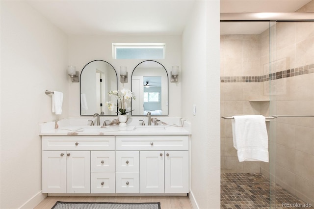 7453 E Jefferson Dr, Denver, CO 80237 - full bathroom with tiled shower and double vanity