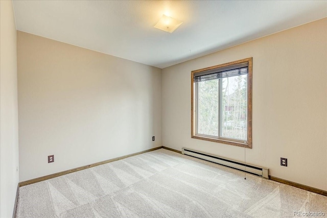 unfurnished room with baseboards, carpet, and baseboard heating