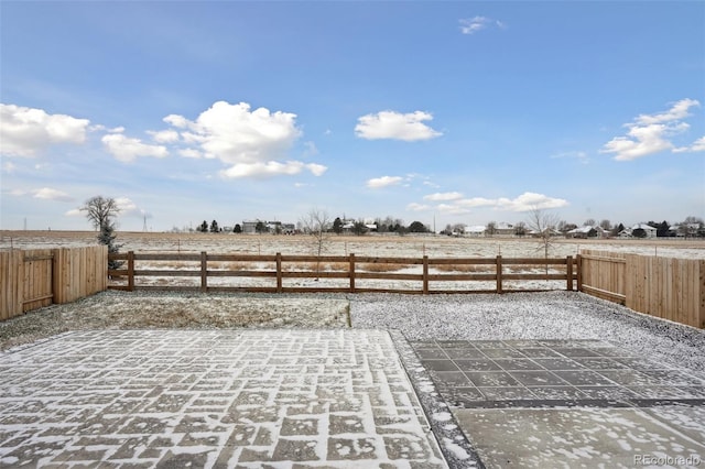 view of patio / terrace featuring a rural view