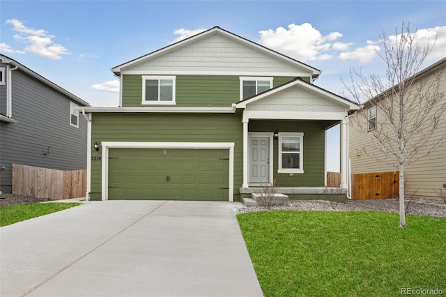 view of front facade featuring a garage and a front yard