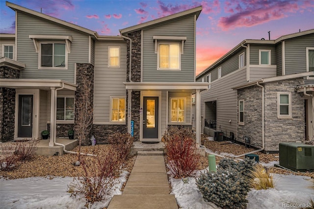 view of front of home featuring central AC unit